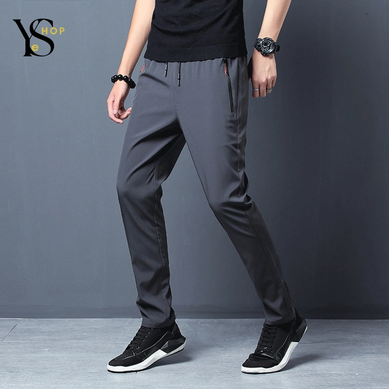 Restez à l'aise avec ce pantalon de course tendance à séchage rapide pour hommes - un pantalon de sport léger et décontracté avec des poches zippées, parfait pour le jogging | YeuroShop